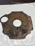 460-390 1H821 MGA REAR ENGINE BACK PLATE STEEL HIGH STARTER MOUNT USED