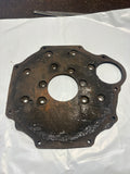 460-390 1H821 MGA REAR ENGINE BACK PLATE STEEL HIGH STARTER MOUNT USED